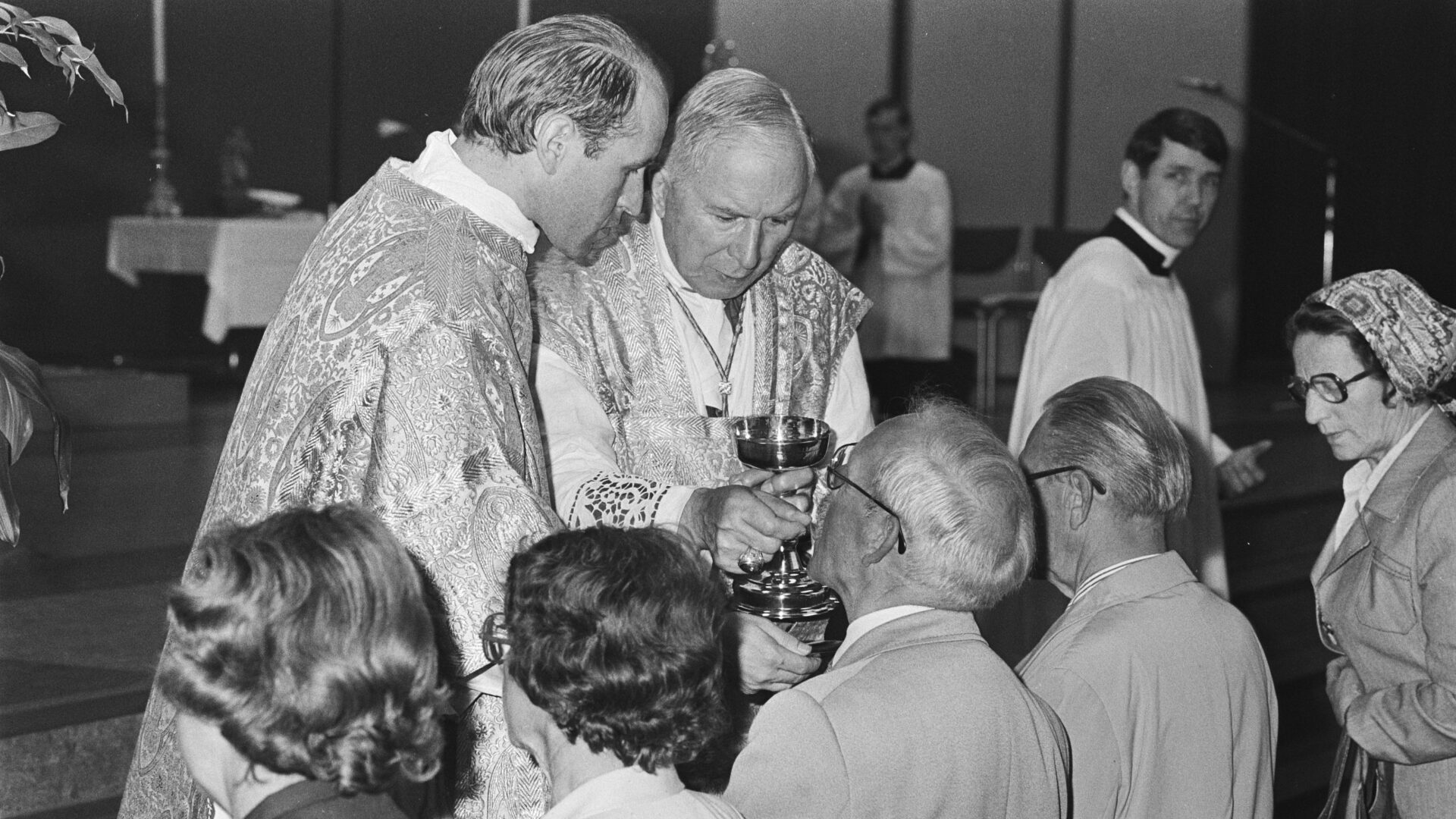 https://crisismagazinecom.s3.amazonaws.com/wp-content/uploads/2026/03/Veldhoven_Archbishop_Lefebvre_giving_Communion_with_Franz_Schmidberger-e1772653981639.jpg