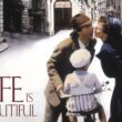 Life Is Beautiful movie poster: Roberto Benigni kisses his wife beside his young son on a bicycle on an Italian street